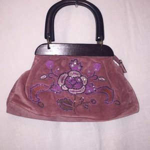 Suede like purse with beaded design on front